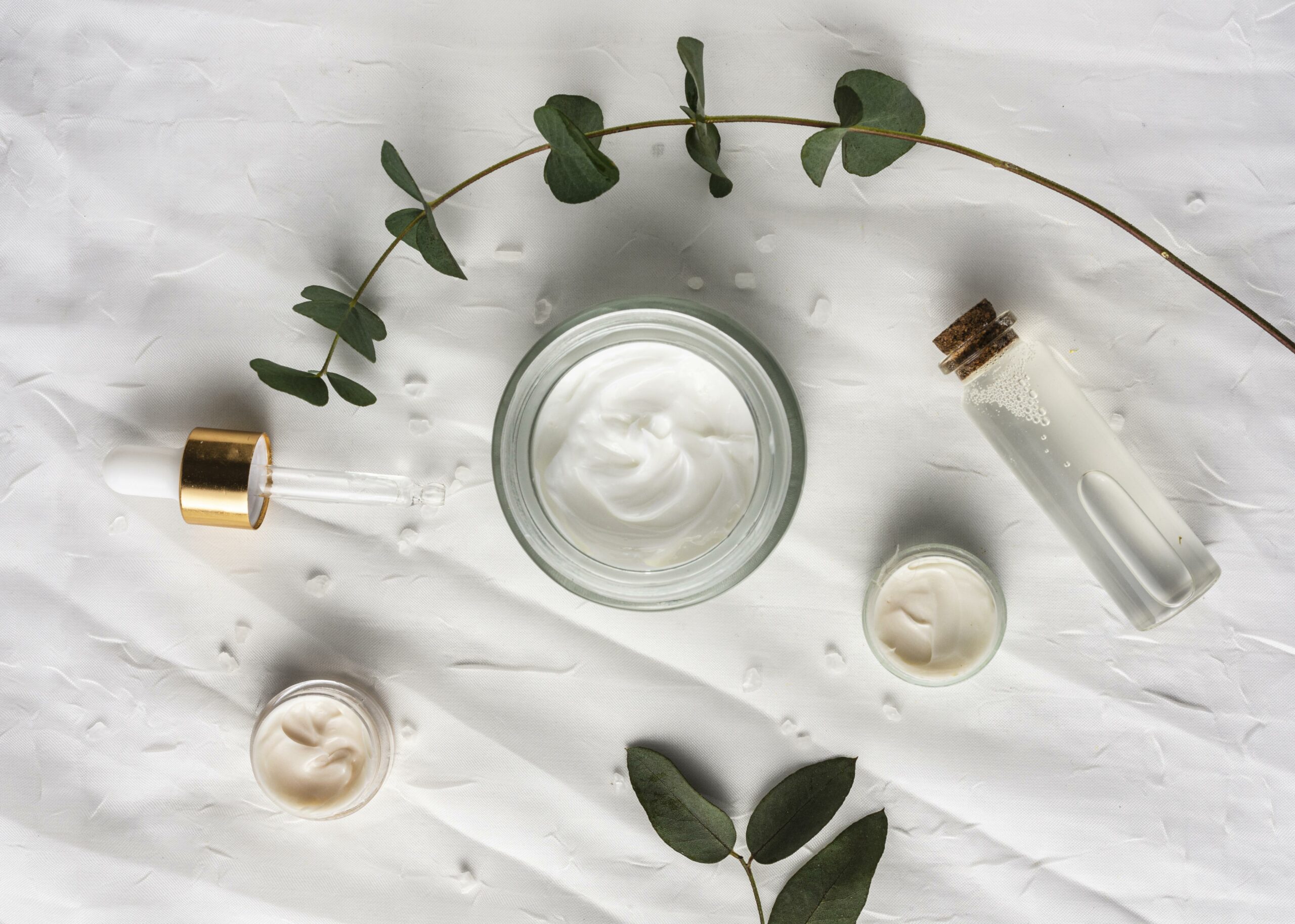 top-view-cream-container-with-plant